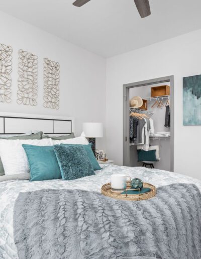 Bedroom With Bed & Painting